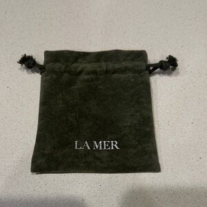 La Mer green crushed velvet small drawstring pouch